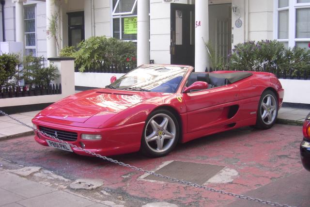 This nice Ferrari was parked outside our London hostel.