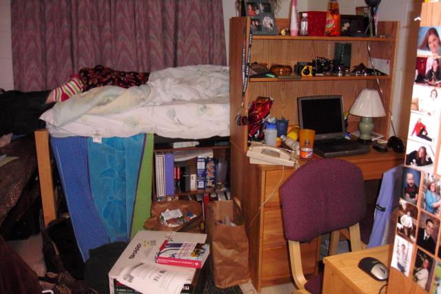 Becky's messy dorm room -- but really, this is her roommate's crap