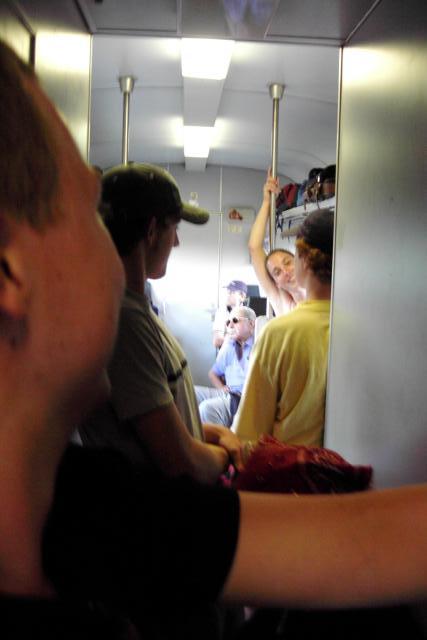 Megan smiling on the train.  We thought it was crowded at this point, but we were proved wrong.