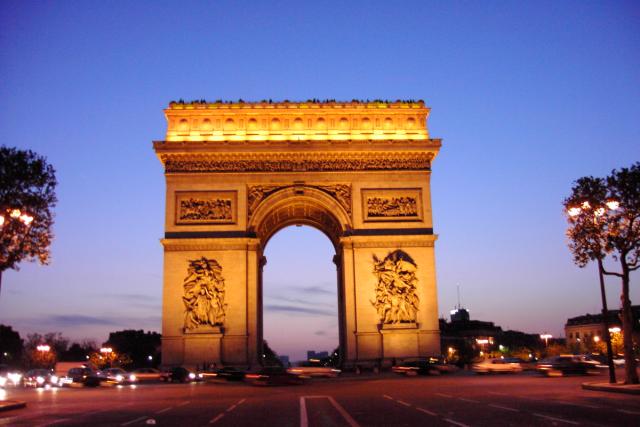 The Arc de Triumph all lit up at night.  I had to stand in the middle of the street to get this picture.