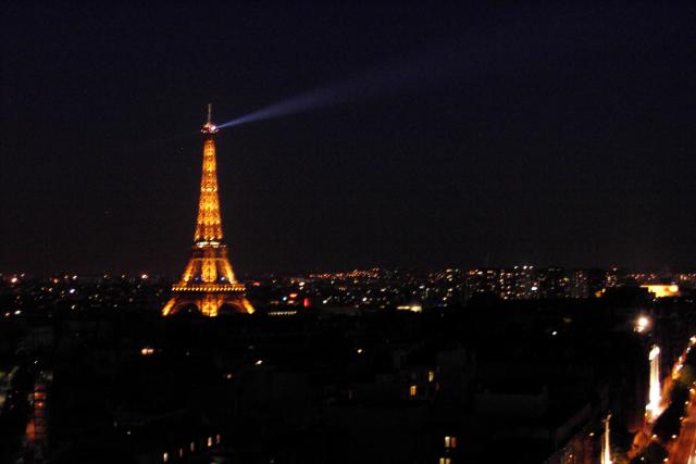 The Eiffel Tower at night.  The search light on top makes a great picture.