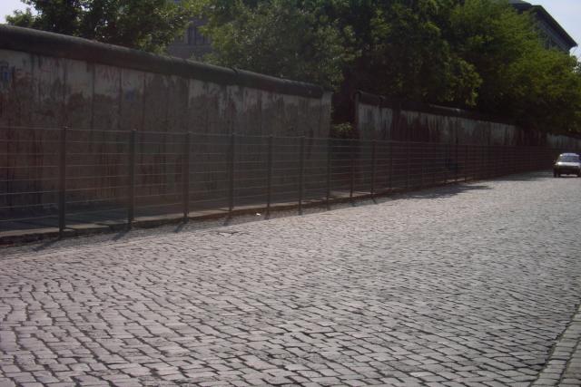 This is what's left of the Berlin wall.  They built a fence around it so people won't take any more pieces of it.